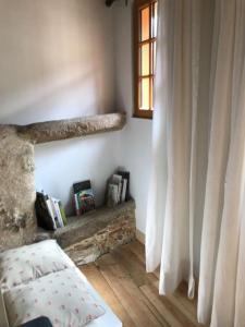 Appartements Petite Maison medievale : photos des chambres
