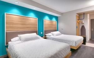Queen Room with Two Queen Beds room in Tru By Hilton St. George
