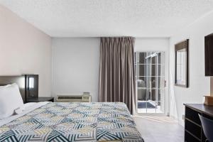 Queen Room with Two Queen Beds - First Floor room in Quality Inn Pecos