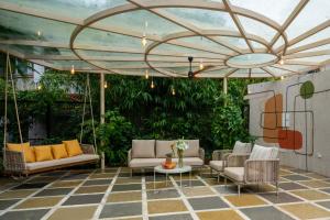 StayVista at Gulmohar Gardens with Gazebo, BBQ