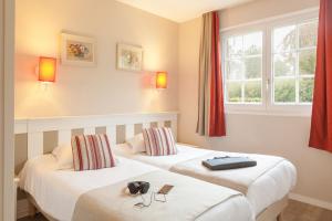 Appart'hotels Village Pierre & Vacances Normandy Garden : photos des chambres