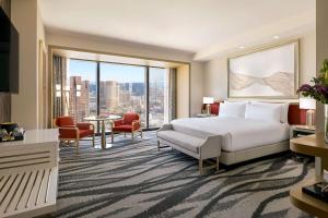 Premium King Room with Strip View room in Conrad Las Vegas At Resorts World