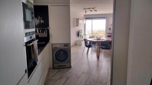 Beachfront Apartment with Sea Views & Private Parking