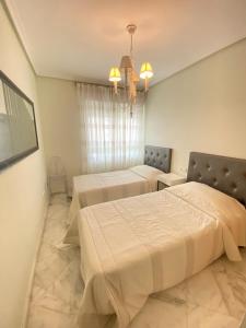 Elegant 2-Bedroom Apartment in Benidorm with Private Pool and Scenic Garden Views