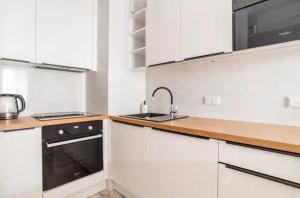 LUX 2 pokojowe Apartment in Warszawa z bezpłatnym podziemnym parkingem