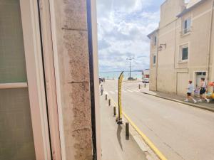 Appartements La Belle Mer by MRODBNB - Appart Neuf - Apercu Mer - 25m Plage & Resto - Cine - Cheminee - Popcorn : photos des chambres