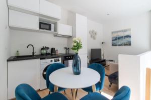 Appartements sousplex Cosy - proche tram et Corum - CLIM : photos des chambres