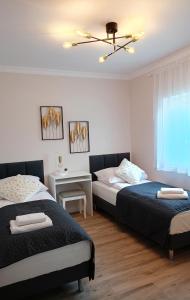 Apartament Sosnowy z dwoma sypialniami i ogródkiem