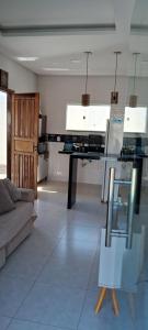 Casa com piscina e espaço gourmet a 30m da praia!