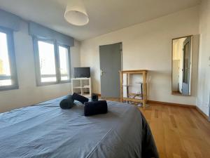 Appartements Studio Centre ville - Wifi gratuit : photos des chambres