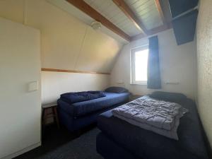 Het Familie Boshuisje - vakantiewoning op prachtig park met veel faciliteiten inc ligbad