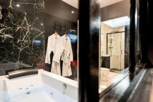 Appartements * Love Room jacuzzi * : photos des chambres