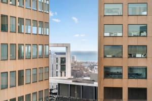 Central Sky High Living on Little Collins
