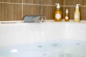 Appartements Love Room et spa - Le Cocon : photos des chambres