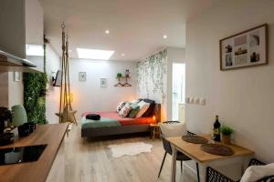 Appartements Love Room et spa - Le Cocon : photos des chambres
