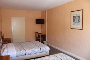 Hotels Le Commerce : photos des chambres