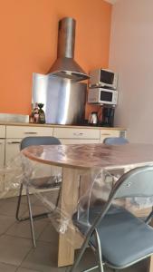 Appartements Grand studio-Loft-grand parking-climatise-proche centre : photos des chambres