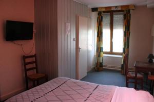 Hotels Le Commerce : photos des chambres