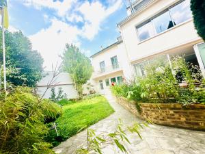 Maisons d'hotes Reims Sherpa Guest House : Chambre Double - Vue sur Jardin