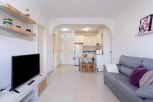 Agradable piso con piscina & playa terraza y WIFI