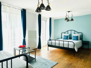 Maisons d'hotes Reims Sherpa Guest House : photos des chambres