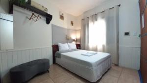 Suíte Charmosa em Hospedaria no Centro