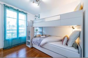 Villas Gite La Villa Omagny Paris Marne-la-Vallee : photos des chambres