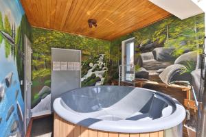 Maisons de vacances Locations des 3 sommets avec Sauna et Spa en Alsace : photos des chambres
