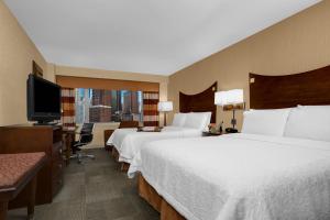 Queen Room with Two Queen Beds with Bath Tub - Disability Access room in Hampton Inn Manhattan-Times Square North