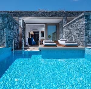 Deluxe Junior Suite Sea View with Private Pool room in Nana Princess Suites Villas & Spa
