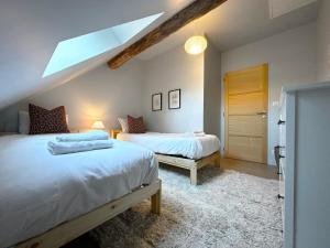 Maisons de vacances Charming house in Burgundy, “Les Coquelicots” : photos des chambres