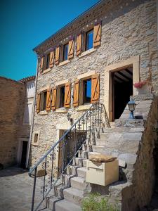 Maisons de vacances Maison en pierre avec piscine : photos des chambres