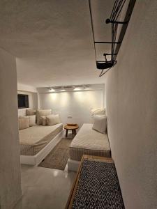 Pouletis Family Apartments - Akroyali Seaview Getaways