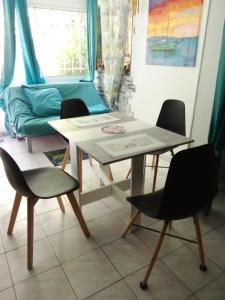 Appartements Jardin et bambous, studio cosy, classe : photos des chambres