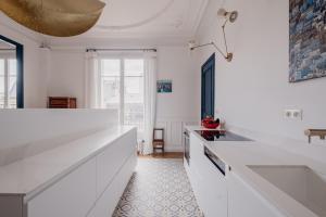 Appartements Veeve - Blue & White Brilliance : photos des chambres