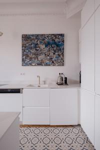 Appartements Veeve - Blue & White Brilliance : photos des chambres