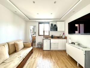 Appartements 2 pieces pres de Paris et stade France/4mins metro : photos des chambres