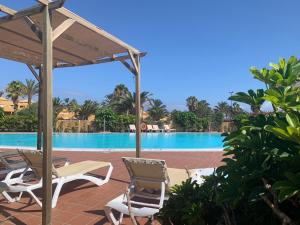 Bedroom with shared bathroom and swimming pool