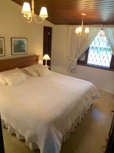 Casa Campos do Jordão, bairro Capivari, Wi-Fi, churrasqueira e forno de pizza, totalmente equipada