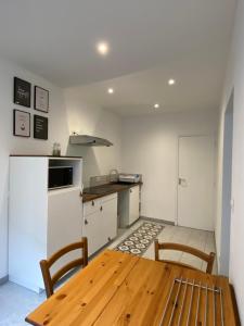 Appartements Hotel particulier Bel appartement en rez-de-chaussee : photos des chambres