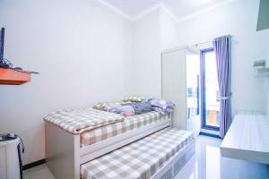 Harsari Syariah with Karaoke and Balcony