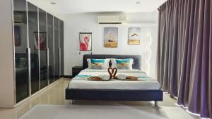 Patong Villa1三卧泳池别墅两个海景房 近班赞江西冷海滩中文管家