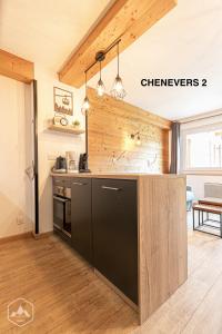 Appartements LES CHENEVERS : photos des chambres