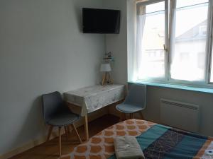 Appartements Appartement paisible - coeur de ville : photos des chambres