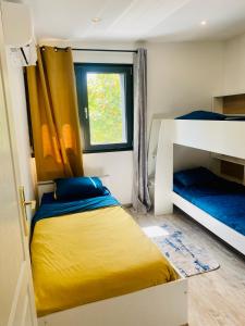 Appartements Duplex climatise avec une terrasse sur jardin : photos des chambres