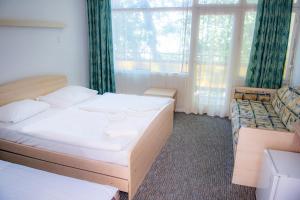 Quadruple Room room in CE Napfény Hotel