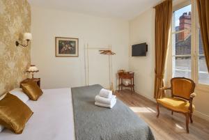Hotels Hotel De France Et De Guise : photos des chambres