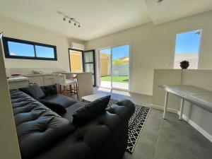 Appartement Souplex Jardin proche autoroute, plages et attractions, Wifi - TV, calme - 3hvězdičkové hotely ve městě Bessan