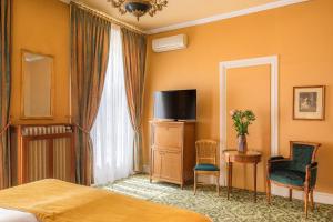 Hotels Grand Hotel Des Templiers : photos des chambres