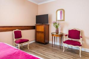 Hotels Grand Hotel Des Templiers : photos des chambres